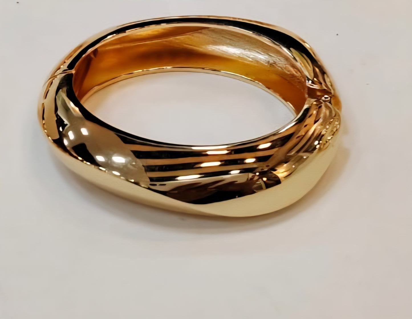 Orbital Hinged Statement Cuff