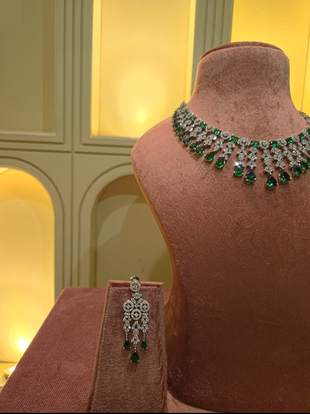 The Emerald Echo Chandelier Drop Suite