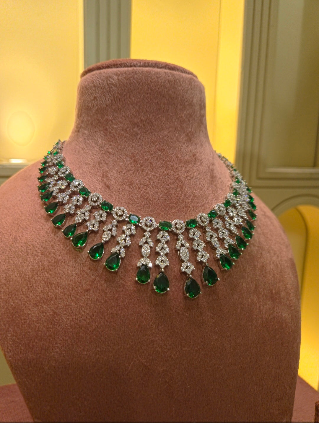 The Emerald Echo Chandelier Drop Suite